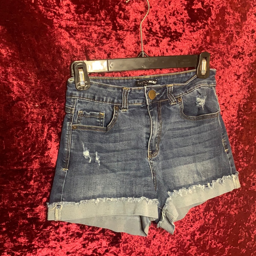 Fashion Nova ripped denim shorts, jegging material size 7